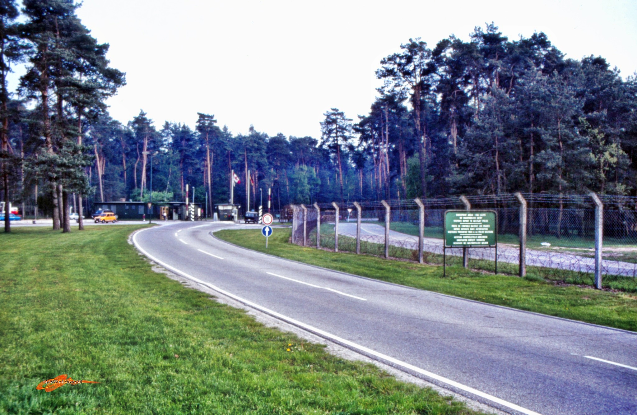 Approaching the checkpoint at the main gate(1985)... photo by Mike Brown (Flickr)